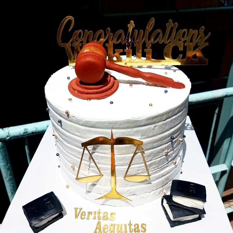 Mint and Cream Bake House — scales of justice graduation cake with gavel and fondant law books